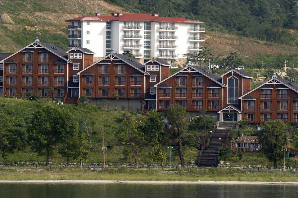 FILE - In this Sept. 1, 2011, file photo, South Korean invested villas line the coastline of the Mount Kumgang resort, also known as Diamond Mountain, in North Korea. North Korea on Friday, Nov. 15, 2019, said it issued an ultimatum to South Korea that it will tear down South Korean-made hotels and other facilities at the North’s Diamond Mountain resort if the South continues to ignore its demands to come and clear them out. (AP Photo/Ng Han Guan, File)
