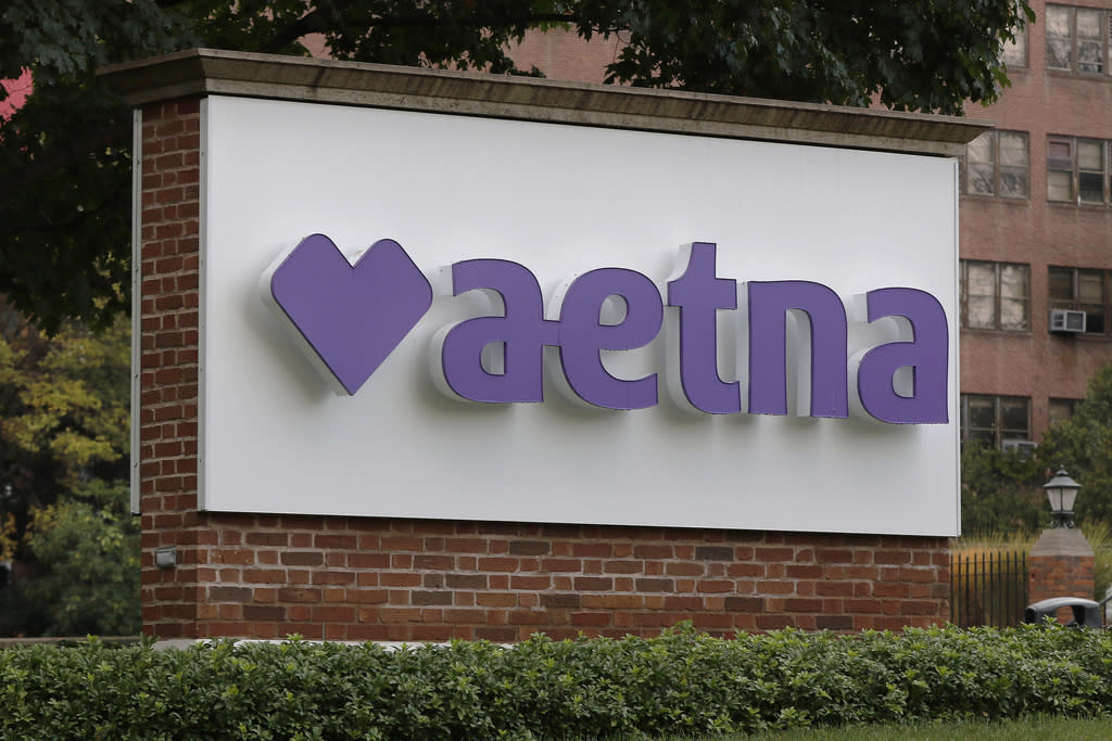 A sign sits on the campus of the insurance and managed health care company Aetna.