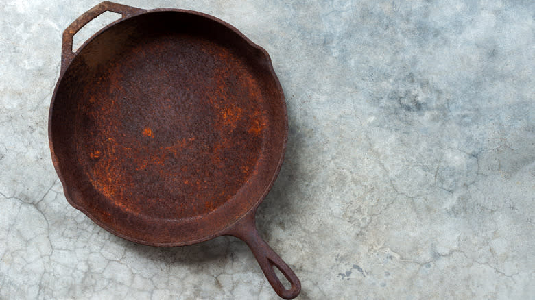 Rusty cast iron skillet