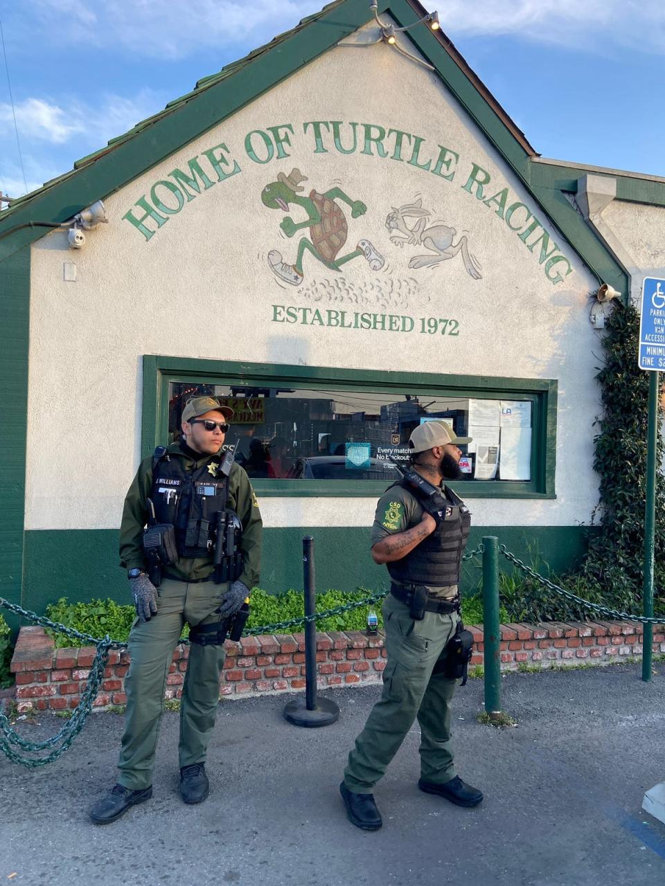 Security personnel outside Brennan’s Pub in Los Angeles (Los Angeles Animal Defense League (LAADL))