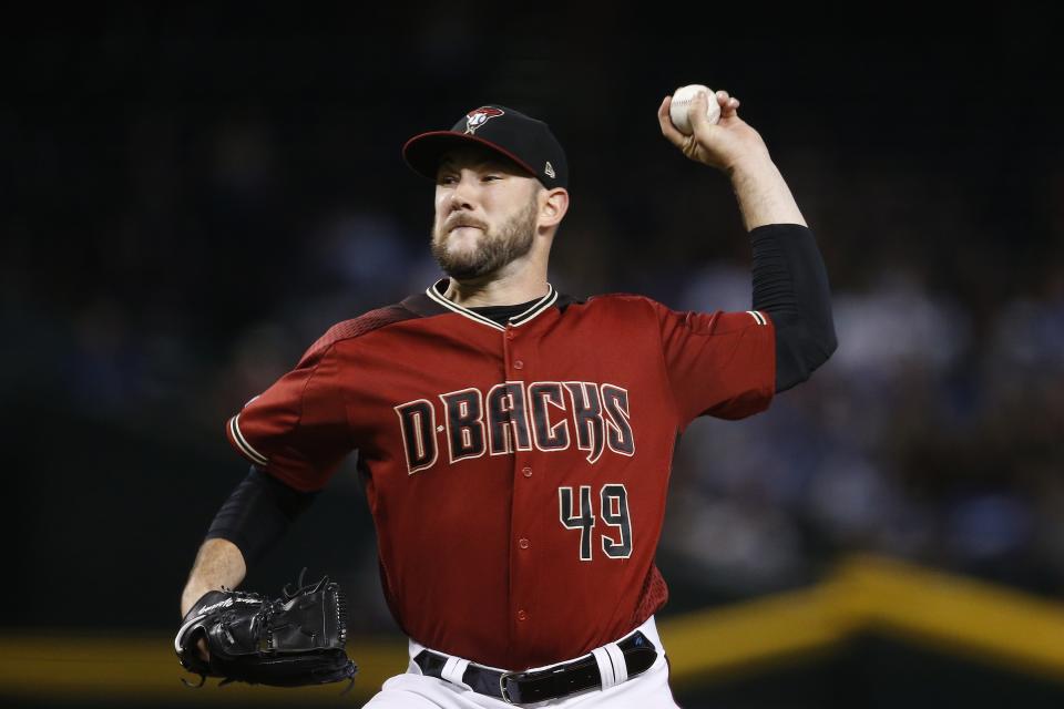 Arizona Diamondbacks starting pitcher Alex Young throws against the Los Angeles Dodgers during the first inning of a baseball game Sunday, Sept. 1, 2019, in Phoenix. (AP Photo/Ross D. Franklin)