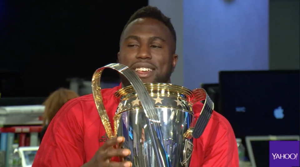 Jozy Altidore at Yahoo with the MLS trophy