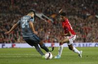 <p>Manchester United’s Marcus Rashford in action with Celta Vigo’s Facundo Roncaglia </p>
