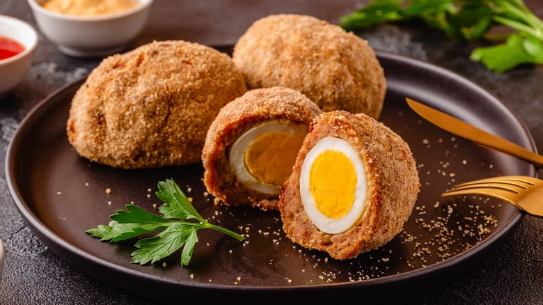 scotch eggs on a plate