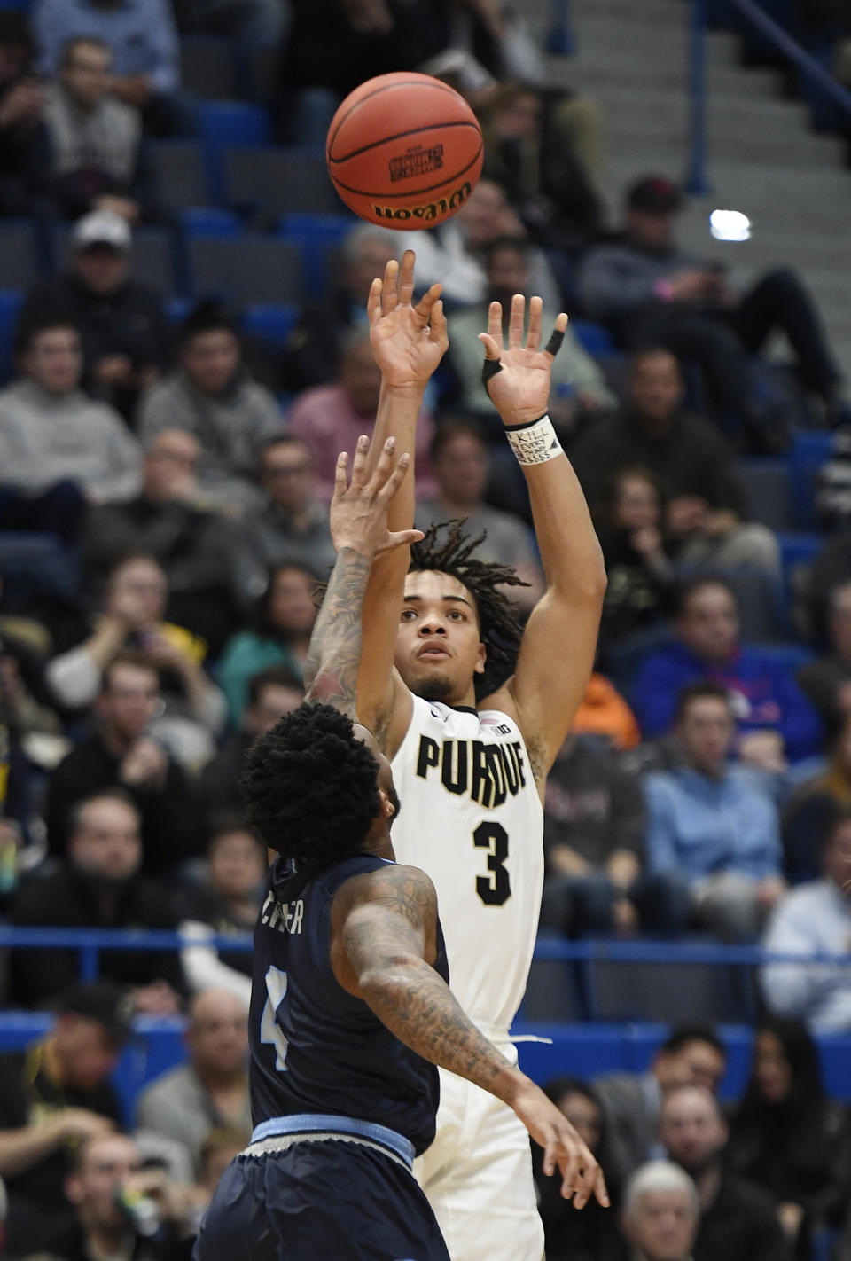 Purdue's Carsen Edwards shoots over Old Dominion's Ahmad Caver during the second half of a first round men's college basketball game against Old Dominion in the NCAA tournament, Thursday, March 21, 2019, in Hartford, Conn. (AP Photo/Jessica Hill)