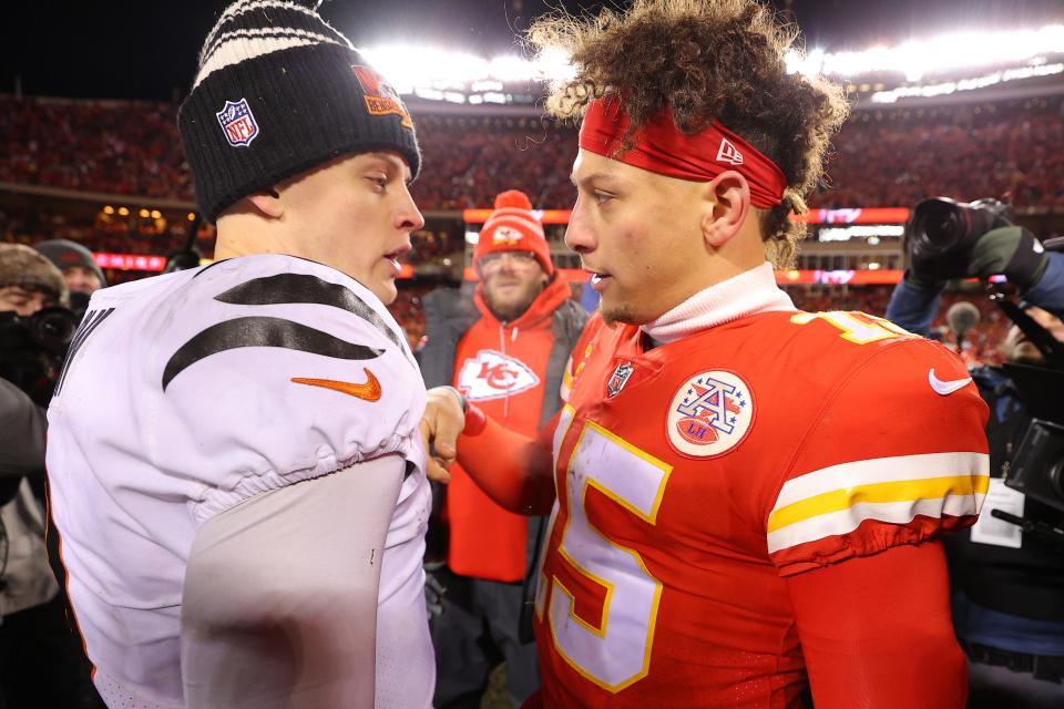 Bengals quarterback Joe Burrow, left, meets with Chiefs quarterback Patrick Mahomes after the AFC championship game at GEHA Field at Arrowhead Stadium in Kansas City, Missouri on Jan. 29, 2023.