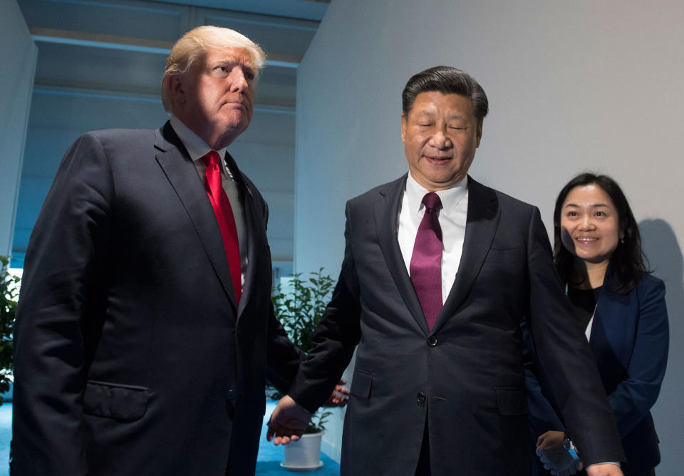 <p>President Donald Trump and Chinese President Xi Jinping, right, arrive for a meeting on the sidelines of the G-20 Summit in Hamburg, Germany, Saturday, July 8, 2017. (Photo: Saul Loeb/Pool Photo via AP) </p>