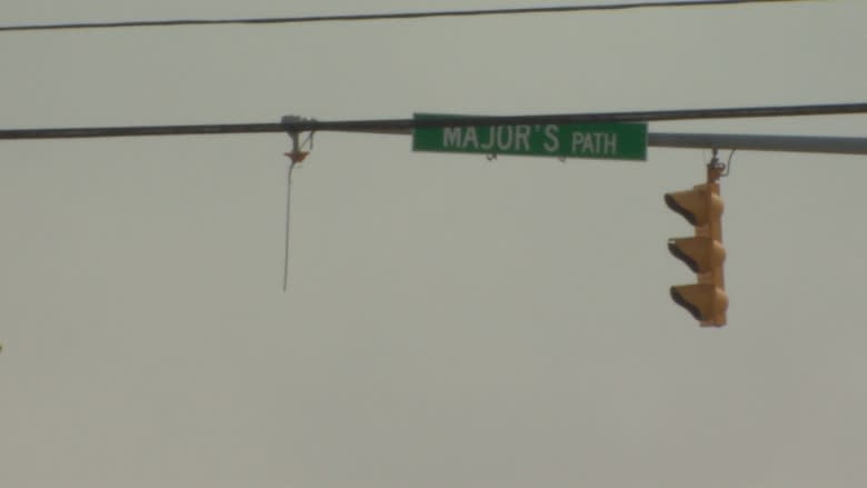 To hang or affix? St. John's defends how it installs traffic lights