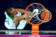 Alex Garcia #8 of Brazil dunks the ball in the second half while taking on Argentina during the Men's Basketball quaterfinal game on Day 12 of the London 2012 Olympic Games at North Greenwich Arena on August 8, 2012 in London, England. (Photo by Ronald Martinez/Getty Images)