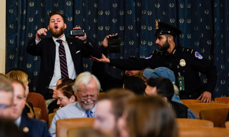 A Trump supporter interrupts the House judiciary committee hearing on Capitol Hill on 9 December.