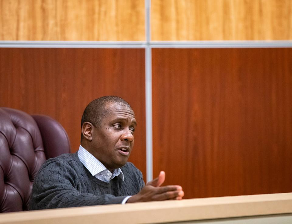 Volunteer coach Arthur Hester, a court commissioner, sits in as the judge during a mock trial practice at Indio High School in Indio, Calif., Wednesday, Feb. 7, 2024.