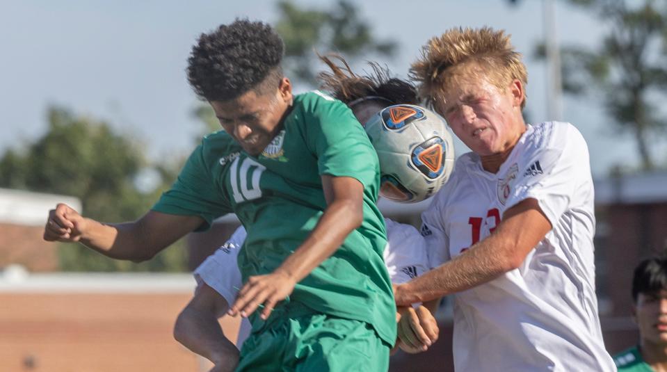 Long Branch Anthony Vasquez and Ocean Marc Gleason battle for a head ball in first half action.  Ocean Township Boys Soccer defeats Long Branch 2-0 in Ocean Two on September 14, 2022.