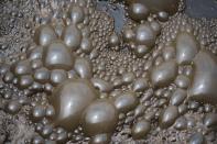 Bubbles form from the polluted water of the Bagmati River as it is processed at the Guheswori Wastewater Treatment Plant before it reaches the Pashupatinath Temple in Kathmandu, Nepal, Friday, June 3, 2022. (AP Photo/Niranjan Shrestha)