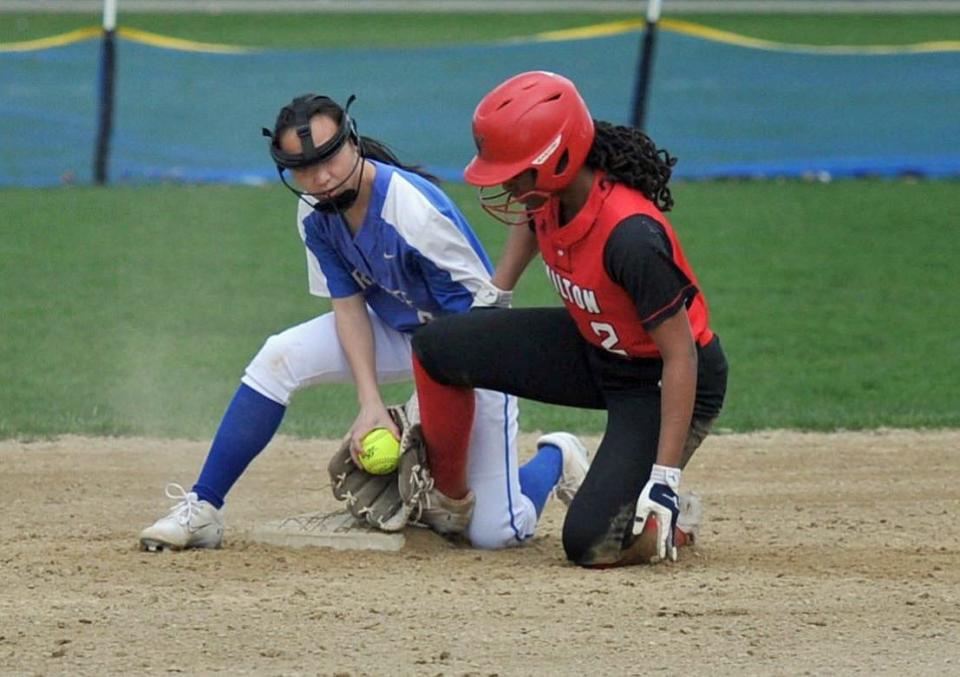 Milton's Shakura Lynch, right, justs beats the tag of Braintree's Catherine McPhee, left, at second during softball action at Braintree High School, Wednesday, April 24, 2024.