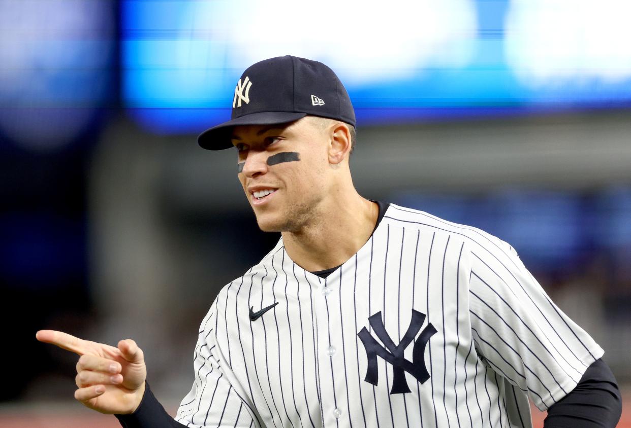 Aaron Judge #99 of the New York Yankees reacts as he comes in from the outfield in the first inning against the Baltimore Orioles at Yankee Stadium on September 30, 2022 in the Bronx borough of New York City.