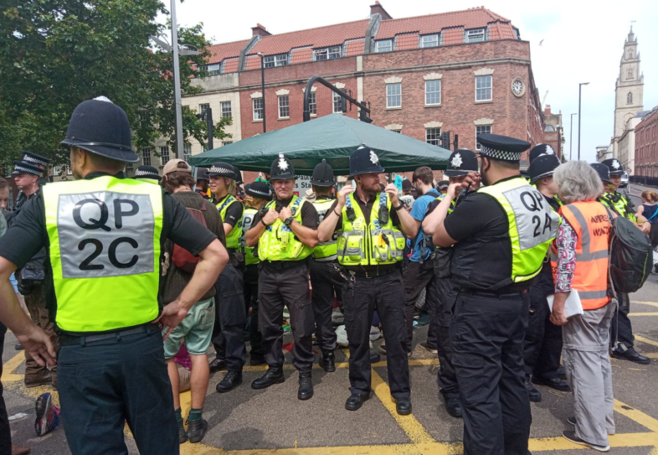 Police had to detach the protesters before their arrest. (Extinction Rebellion Bristol)