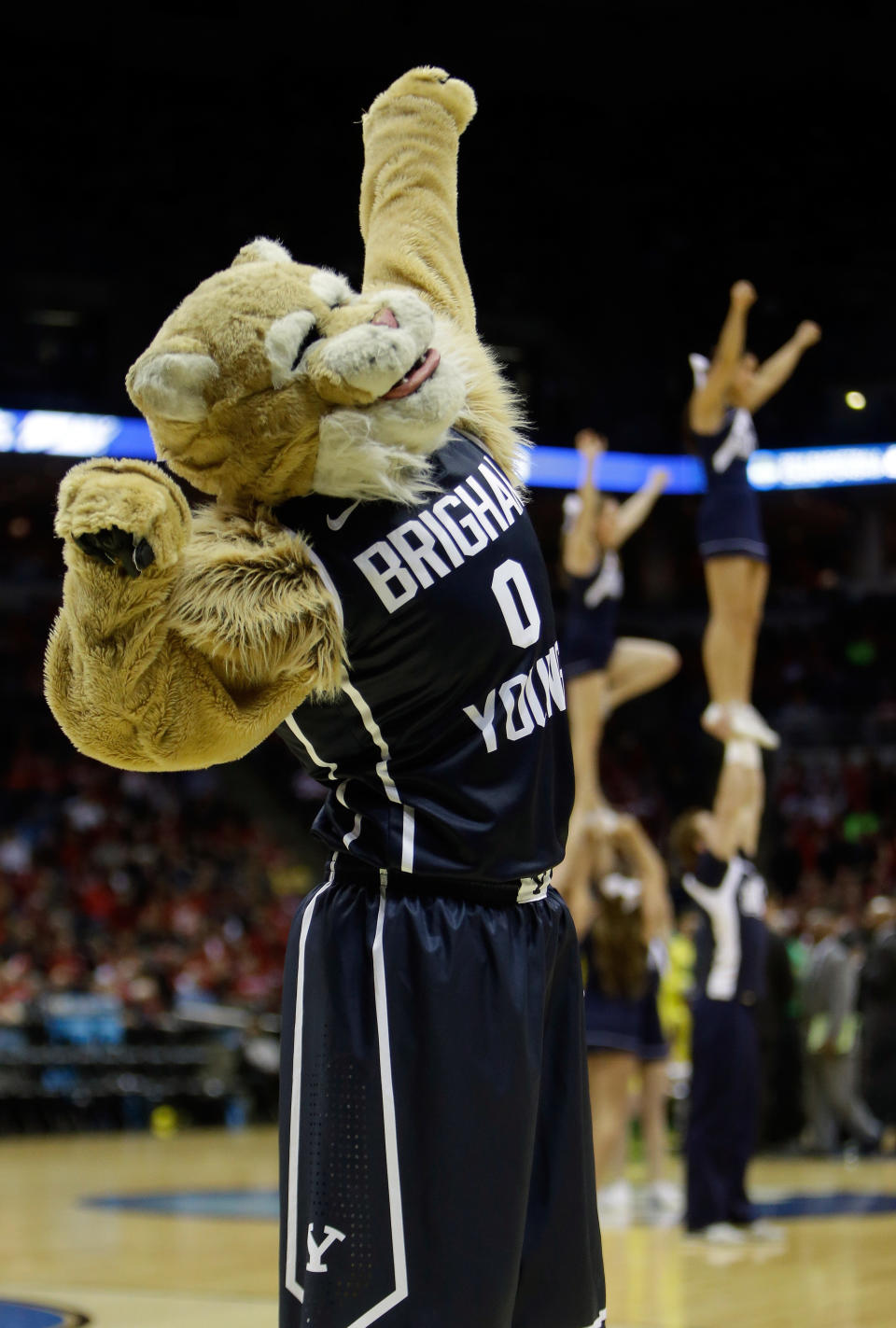 MILWAUKEE, WI - MARCH 20:  Brigham Young Cougars mascot Cosmo the Cougar performs during the second round game of the NCAA Basketball Tournament against the Oregon Ducks at BMO Harris Bradley Center on March 20, 2014 in Milwaukee, Wisconsin.  (Photo by Mike McGinnis/Getty Images)