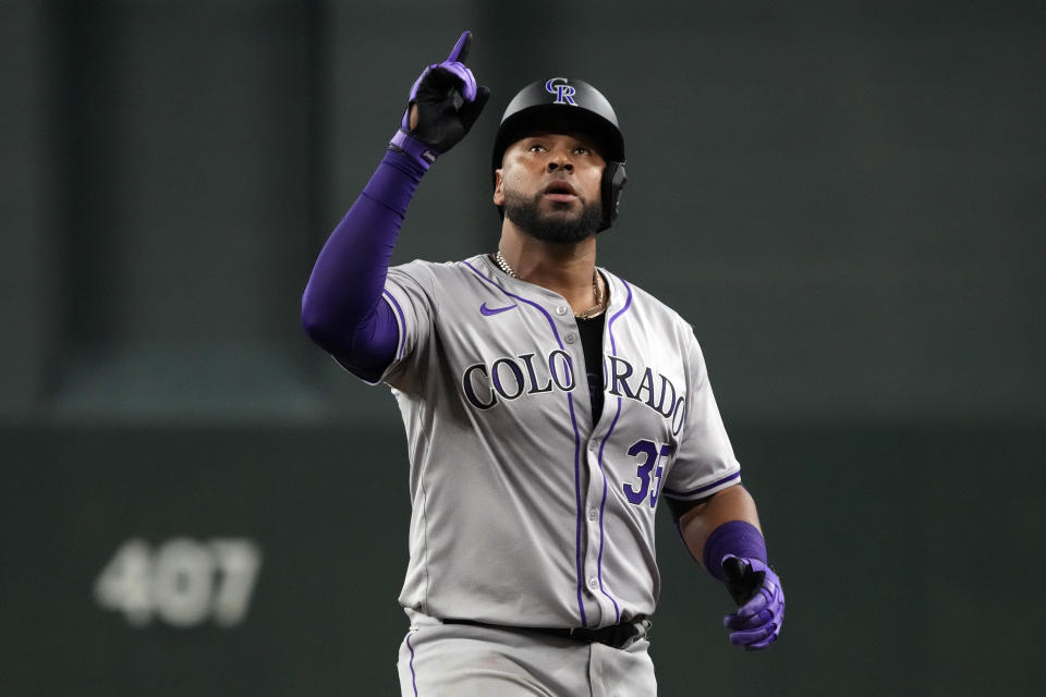 Colorado Rockies catcher Elias Diaz reacts after hitting a single against the Arizona Diamondbacks in the second inning during a baseball game, Saturday, March 30, 2024, in Phoenix. (AP Photo/Rick Scuteri)
