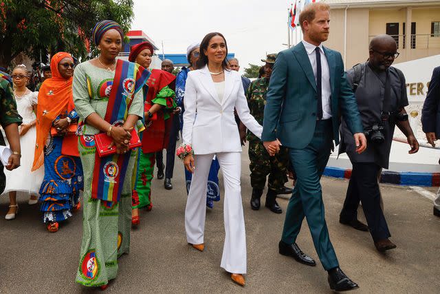 <p>Andrew Esiebo/Getty Images for The Archewell Foundation</p> Prince Harry, Duke of Sussex and Meghan, Duchess of Sussex meet with the Chief of Defence Staff of Nigeria at the Defence Headquarters in Abuja on May 10, 2024 in Abuja, Nigeria.