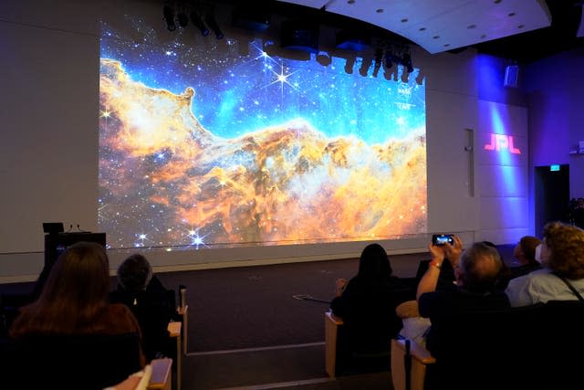 An image of the Carina Nebula, captured on the James Webb Space Telescope, is shown at the Nasa Jet Propulsion Laboratory in Pasadena 