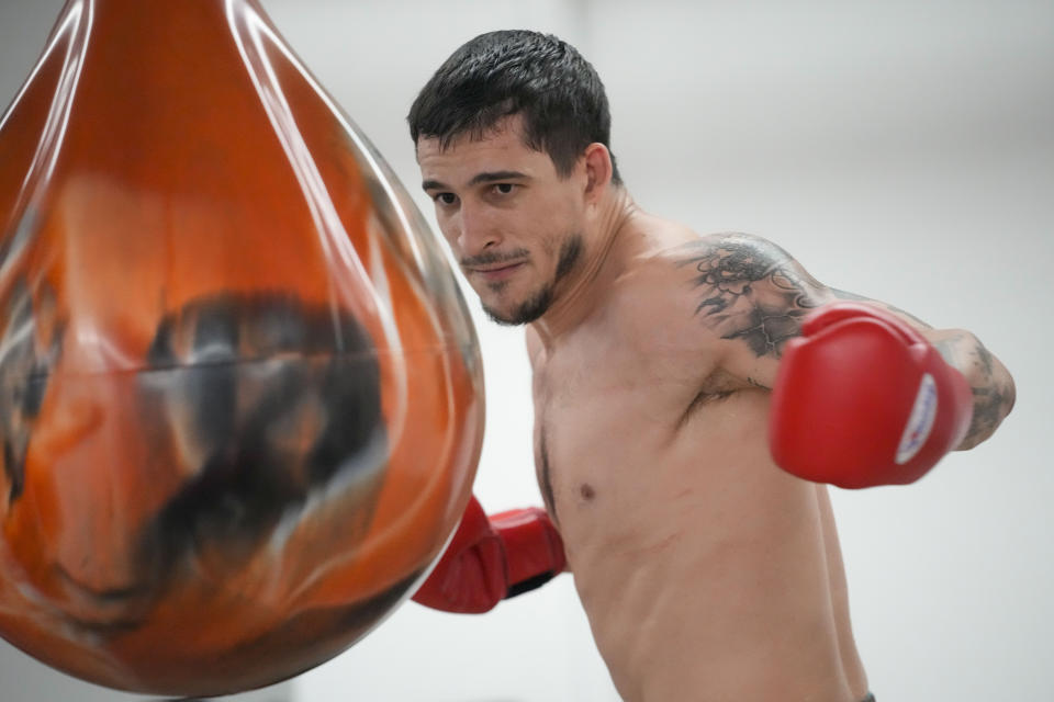 Biaggio Ali Walsh hits a punching bag while training ahead of his return to the Professional Fighters League, Monday, July 24, 2023, in New York. (AP Photo/Mary Altaffer)