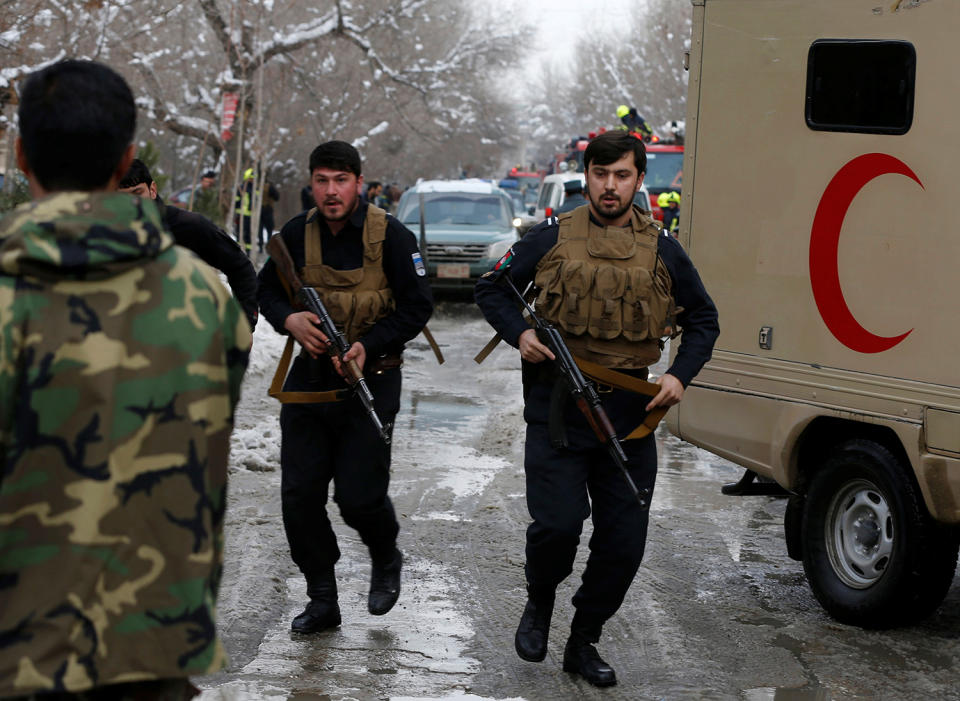 Afghan police arrive at bomb blast site in Kabul
