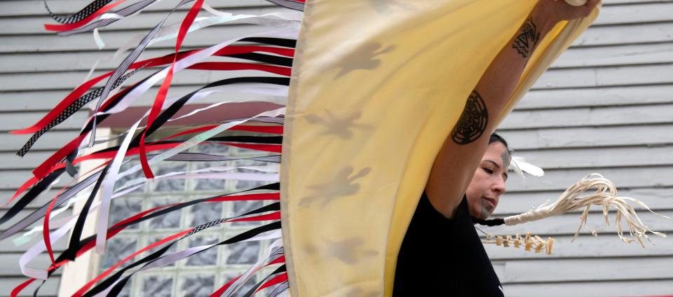Stephanie Big Eagle performs a traditional fancy shawl dance during an Indigenous People's Day event Monday, Oct. 11, 2021, at Thunderbird Rising Studios in Indianapolis' Fountain Square neighborhood.