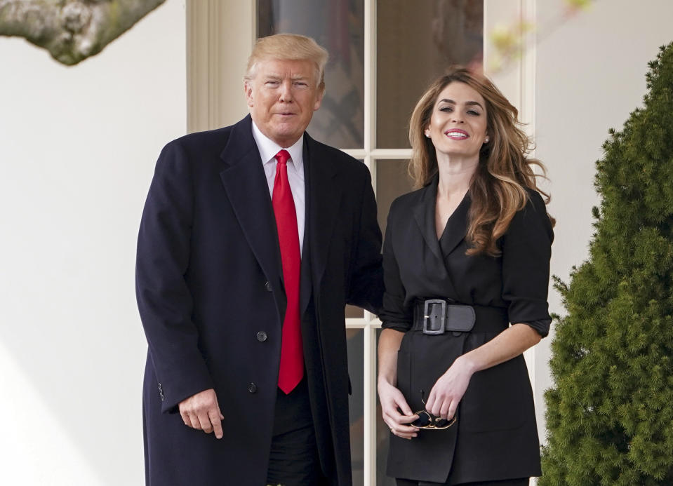 FILE - President Donald Trump poses for members of the media with then White House Communications Director Hope Hicks on her last day before he boards Marine One on the South Lawn of the White House, March 29, 2018, in Washington. Hicks, Trump's former spokeswoman, met Monday, March 6, 2023, with Manhattan prosecutors investigating hush-money payments made on the ex-president's behalf — the latest member of the Republican's inner circle to be questioned in the renewed probe. (AP Photo/Andrew Harnik, File)