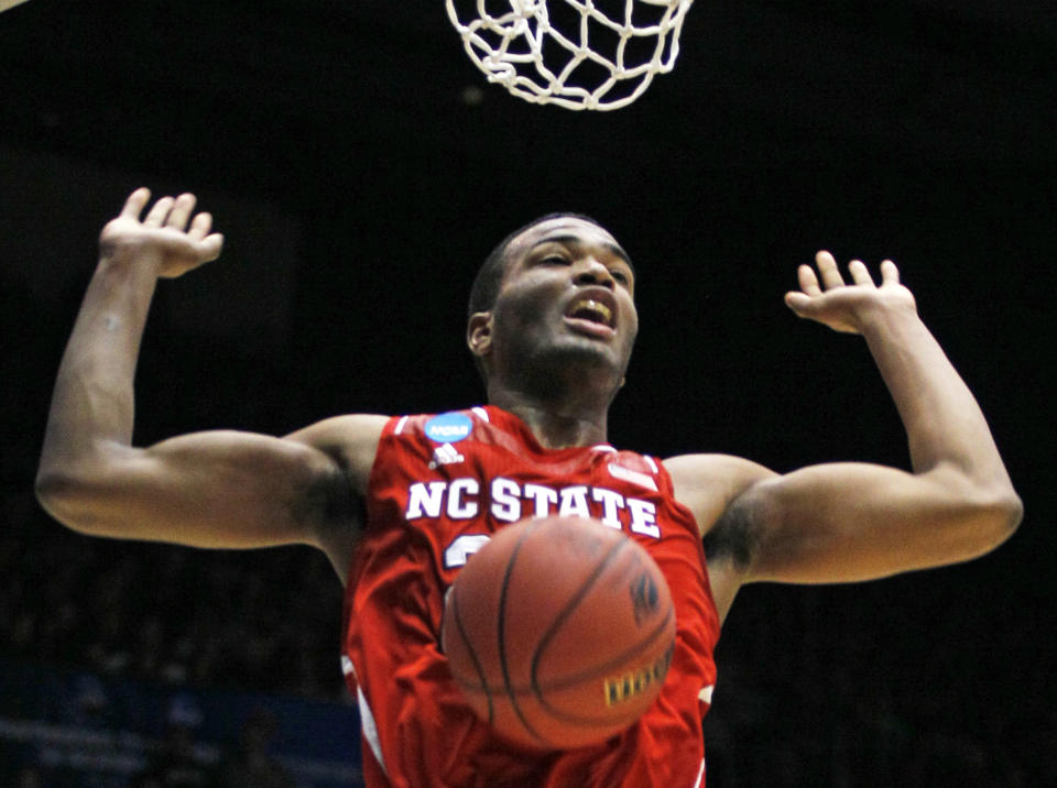 North Carolina State forward T.J. Warren dunks against Xavier in the first half of a first-round game of the NCAA college basketball tournament, Tuesday, March 18, 2014, in Dayton, Ohio. (AP Photo/Skip Peterson)