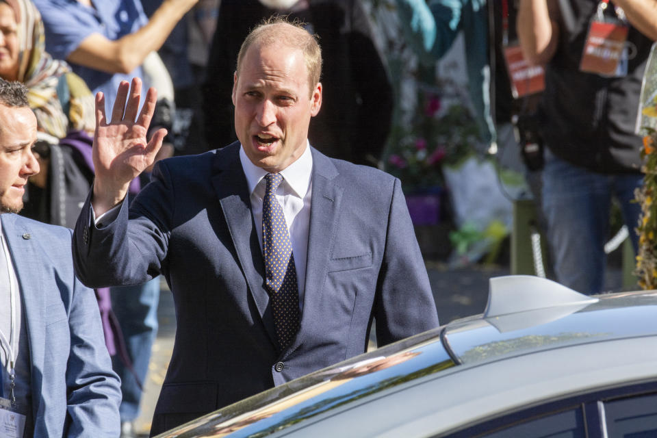 Britain's Prince William acknowledges the crowd after visiting the Al Noor mosque, one of the mosques in the mass shooting, in Christchurch, New Zealand, Friday, April 26, 2019. Prince William visited one of the two Christchurch mosques where 50 people were killed and 50 others wounded in a March 15 attack by a white supremacist. (David Alexander/SNPA via AP)