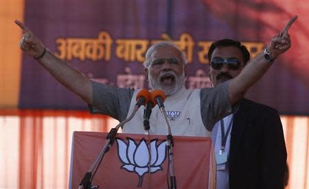 Narendra Modi, prime ministerial candidate for Bharatiya Janata Party (BJP), gestures as he address a rally in Gurgaon on the outskirts of New Delhi April 3, 2014. REUTERS/Adnan Abidi