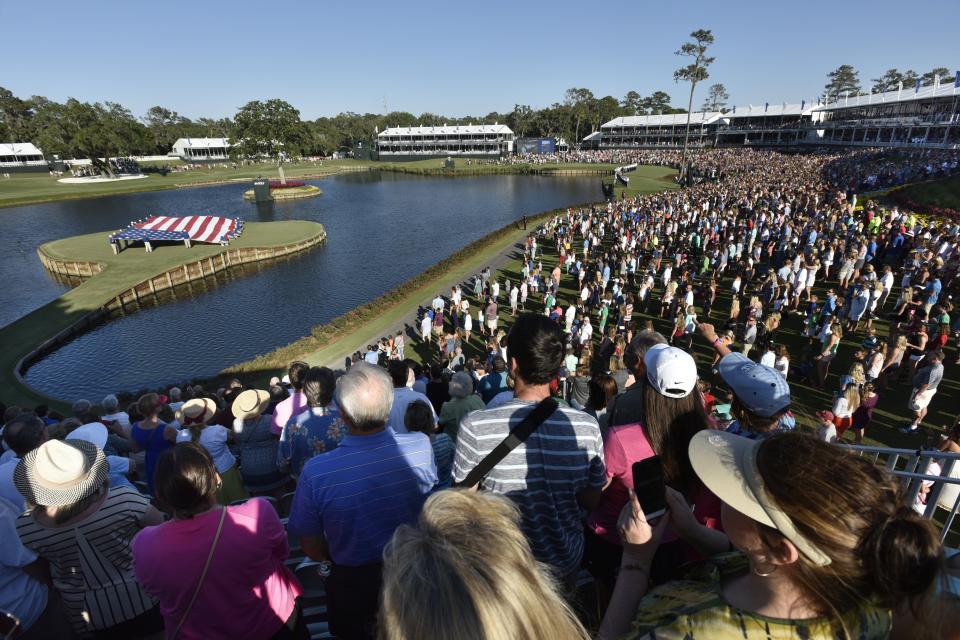 Players Championship fans stand for the National Anthem to begin Military Appreciation Day ceremonies at the 2017 Players.