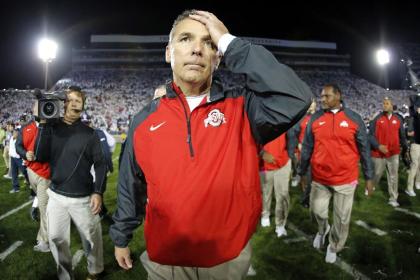 Urban Meyer's Buckeyes have been on the outside of the CFP conversation after their loss to Virginia Tech. (AP)