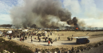 <p>This vivid snap captures evictions from Europe’s biggest migrant camp in northern France. It took first place in the news/events section (Picture: IPP) </p>