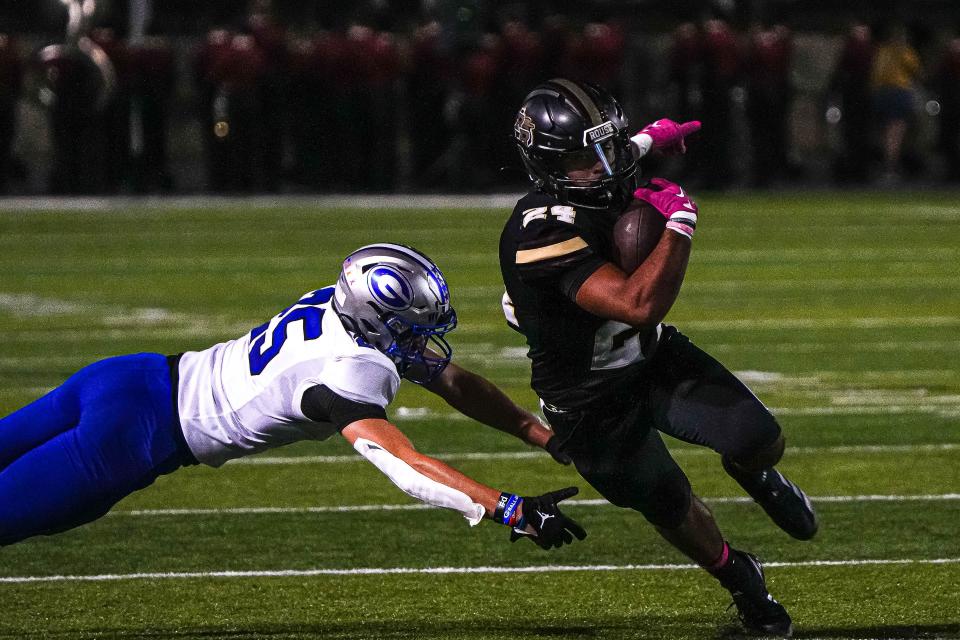 Rouse running back Anthony Reyes (24) dodges a tckle by Georgetown defensive back Alex Wilson (25) during the game at John Gupton Stadium on Thursday, Oct. 10, 2024 in Cedar Park, Texas.