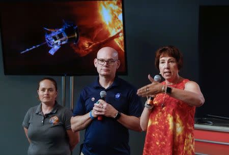 Alex Young, solar scientist at NASA's Goddard Space Flight Center (middle), Nicola Fox, Parker Solar Probe project scientist at Johns Hopkins Applied Physics Laboratory (APL) (right), and Betsy Congdon, Parker Solar Probe Thermal Protection System lead engineer at APL (left), speak during a preview briefing on the NASA's Parker Solar Probe at NASA's Kennedy Space Center in Florida, U.S., July 20, 2018. REUTERS/Mike Brown