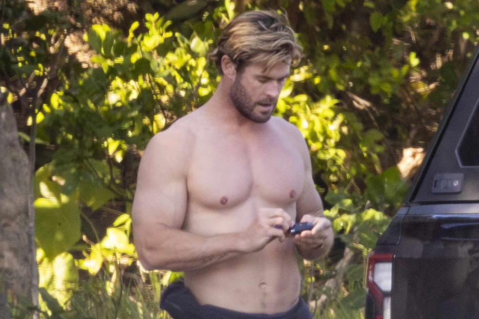 <p>SplashNews.com</p> Chris Hemsworth 40 shirtless in Byron Bay.