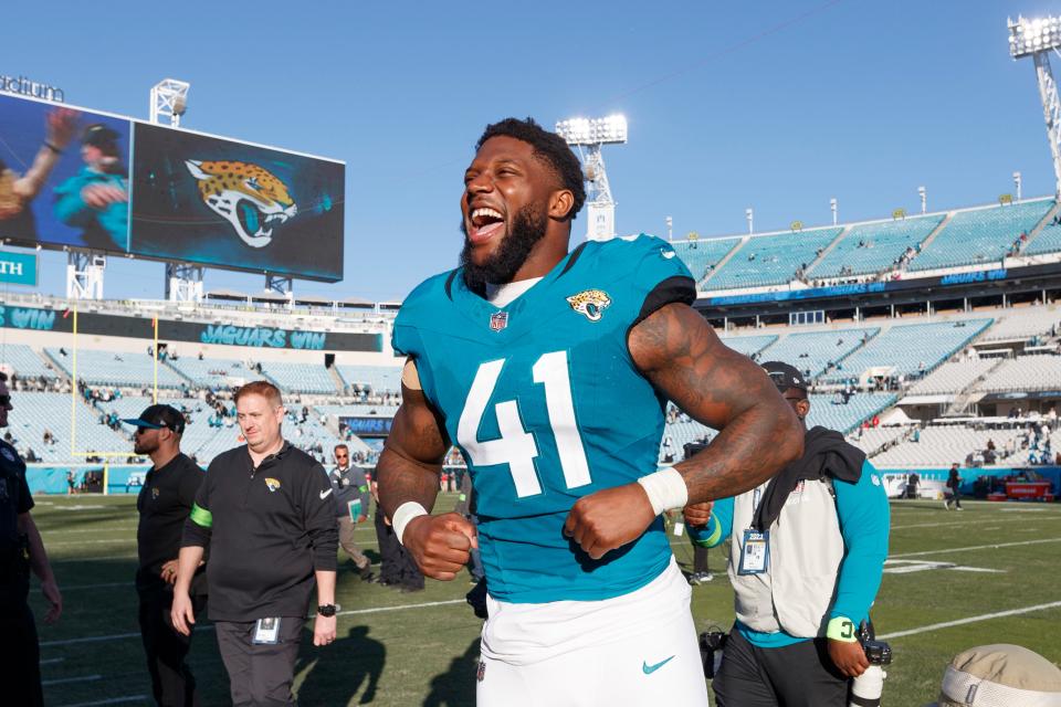 Dec 31, 2023; Jacksonville, Florida, USA; Jacksonville Jaguars outside linebacker Josh Allen (41) celebrates the win against the Carolina Panthers at EverBank Stadium. Mandatory Credit: Morgan Tencza-USA TODAY Sports