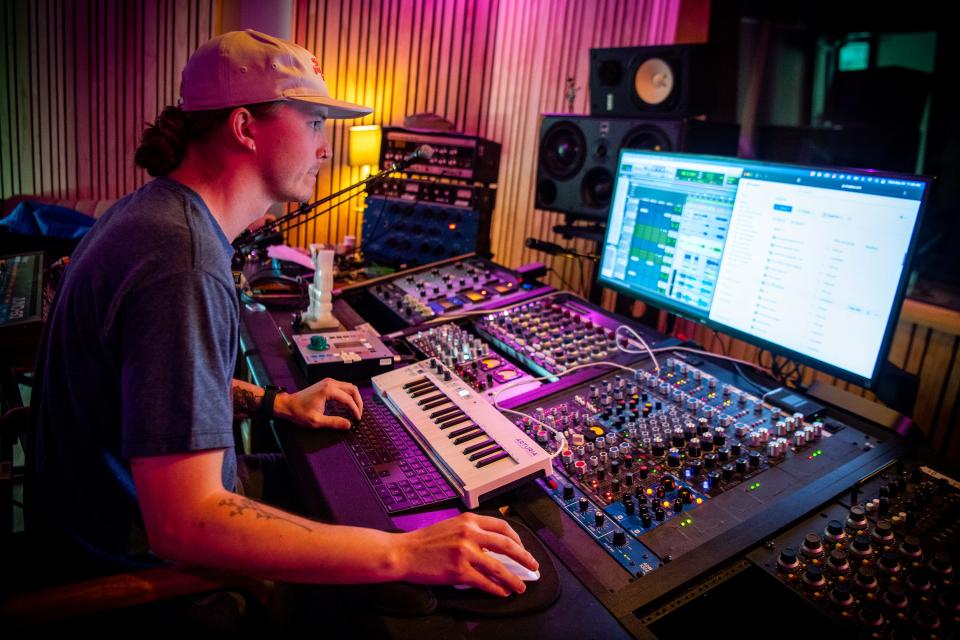 Connor Wheaton downloads files at Pink Moon recording studio in East Knoxville on May 24. Pink Moon is one of thousands of KUB customers that now have KUB Fiber, available to residential and commercial customers.