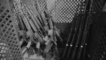 CORRECTION: A photo illustration of military rifles inside a U.S. Marine Corps arms room at Camp Foster. (AP Illustration)