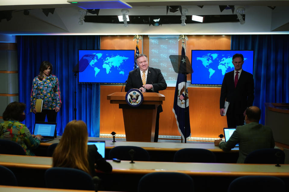 Secretary of State Mike Pompeo speaks during a press conference at the State Department, Wednesday, June 24, 2020 in Washington, as State Department spokeswoman Morgan Ortagus, left, and State Department Coordinator for Counterterrorism, Ambassador Nathan Sales, right, look on. (Mandel Ngan/Pool via AP)