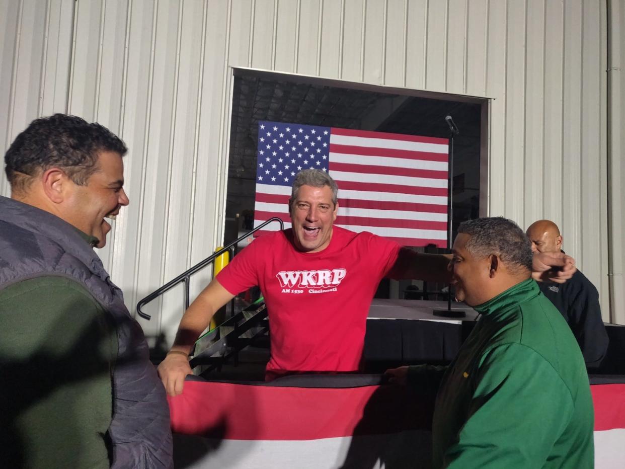 Democratic Ohio Senate hopeful Rep. Tim Ryan shares a laugh with supporters after a campaign rally in Cincinnati, Ohio on November 4, 2022.