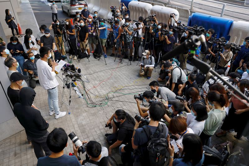 Relatives of 12 activists detained at sea report to the police to seek help in Hong Kong