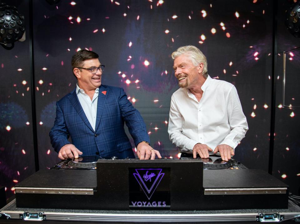 Thomas McAlpin and Richard Branson at a DJ booth