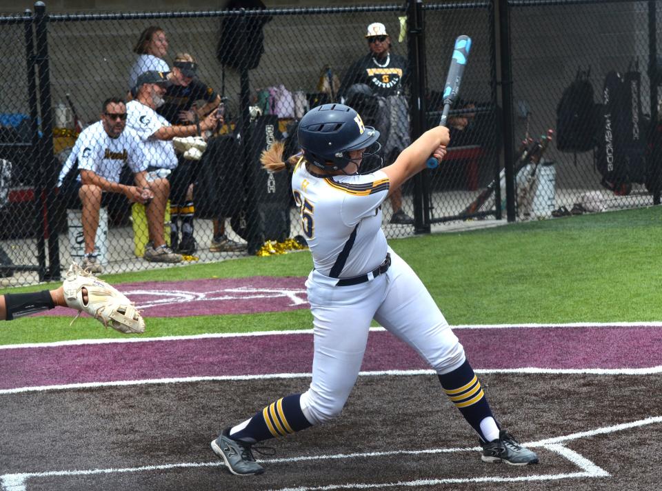 Hartland's Sadie Malik takes a swing during a 7-6 victory over Kalamazoo Central in a regional semifinal softball game Saturday, June 8, 2024.