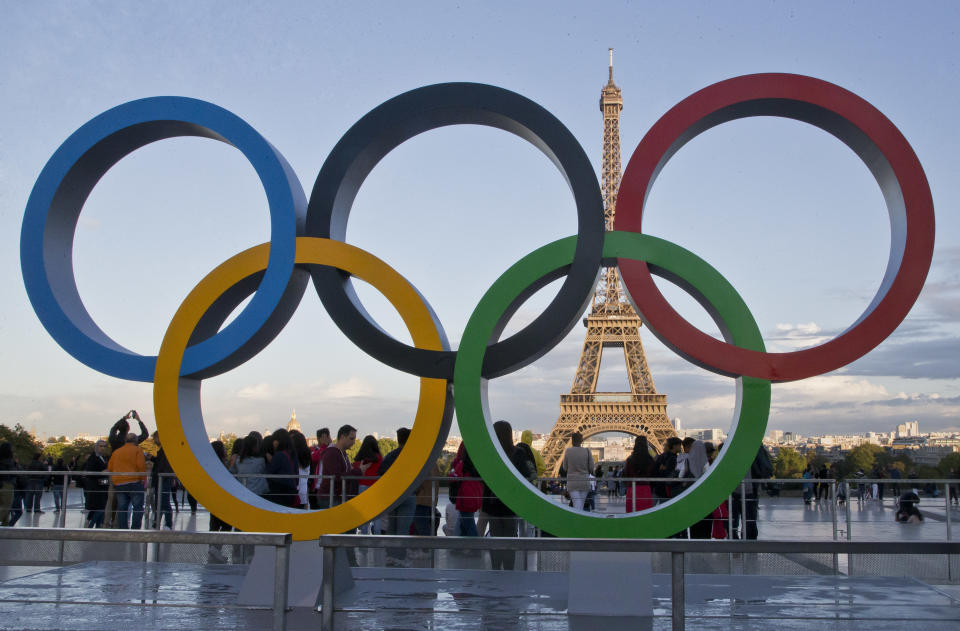 FILE - The Olympic rings are set up at Trocadero plaza that overlooks the Eiffel Tower, a day after the official announcement that the 2024 Summer Olympic Games will be in the French capital, in Paris, France, on Sept. 14, 2017. One year after the invasion of Ukraine began, Russia's reintegration into the world of sports threatens to create the biggest rift in the Olympic movement since the Cold War.(AP Photo//Michel Euler, File)