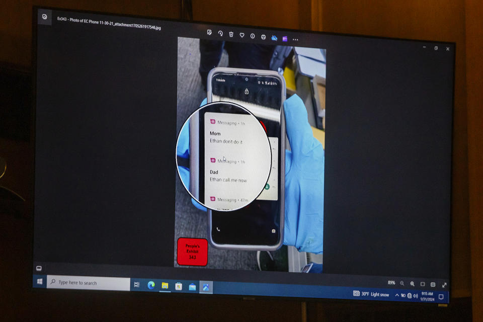 A photograph of Ethan Crumbley's cell phone, taken shortly after he shot and killed four of his classmates at Oxford High School in November 2021, is displayed on a screen during a jury trial for his mother, Jennifer Crumbley,at the Oakland County Courthouse on Wednesday, Jan. 31, 2024, in Pontiac, Mich. Crumbley is charged with involuntary manslaughter. (Katy Kildee/Detroit News via AP, Pool)