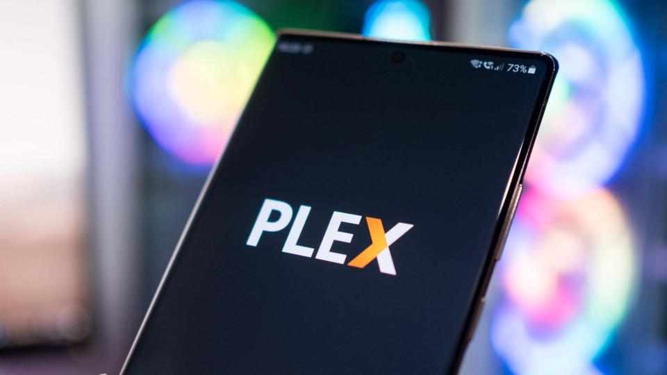 Plex Media Server logo against RGB lighting