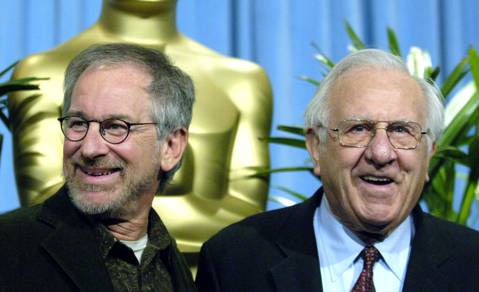 FILE - Steven Spielberg, nominated for best director for his work on "Munich," left, arrives with his father Arnold for the 25th annual nominees luncheon hosted by the Academy of Motion Picture Arts and Sciences in Beverly Hills, Calif. on Feb. 13, 2006. Arnold Spielberg, a pioneering computer engineer, has died. A family statement says he died Tuesday, Aug. 25, 2020, in Los Angeles at 103. (AP Photo/Chris Pizzello)