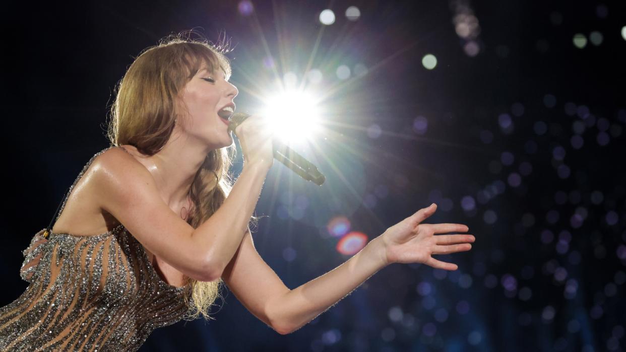  Taylor Swift performs on stage in Singapore. 